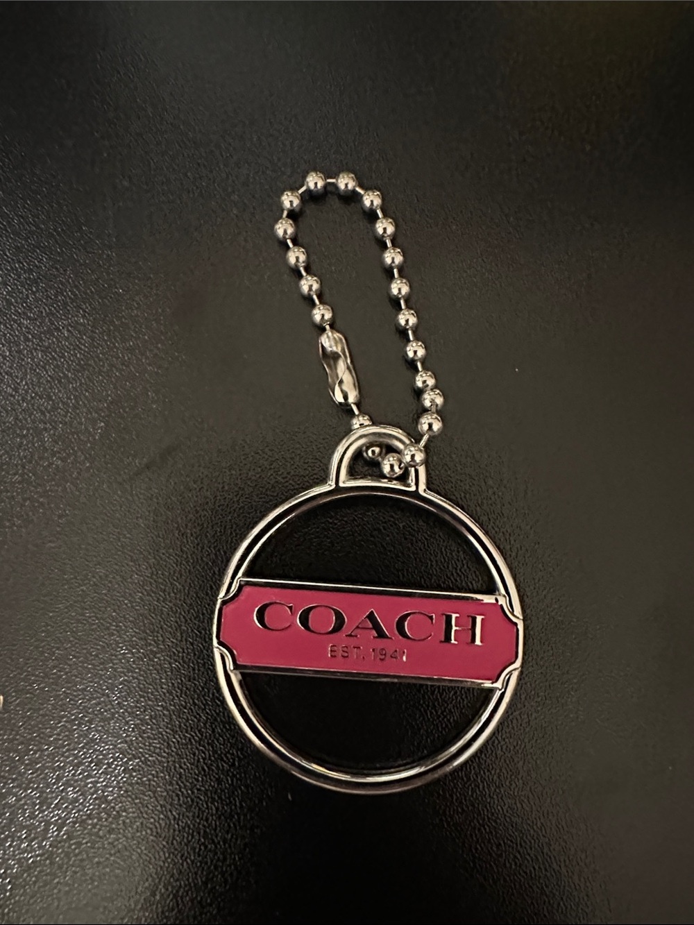 Coach Silver-Tone Keyring with Pink Enamel Logo